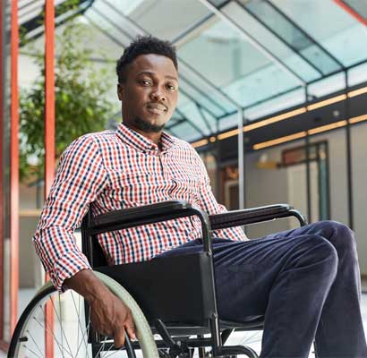 Image of a man on wheel chair