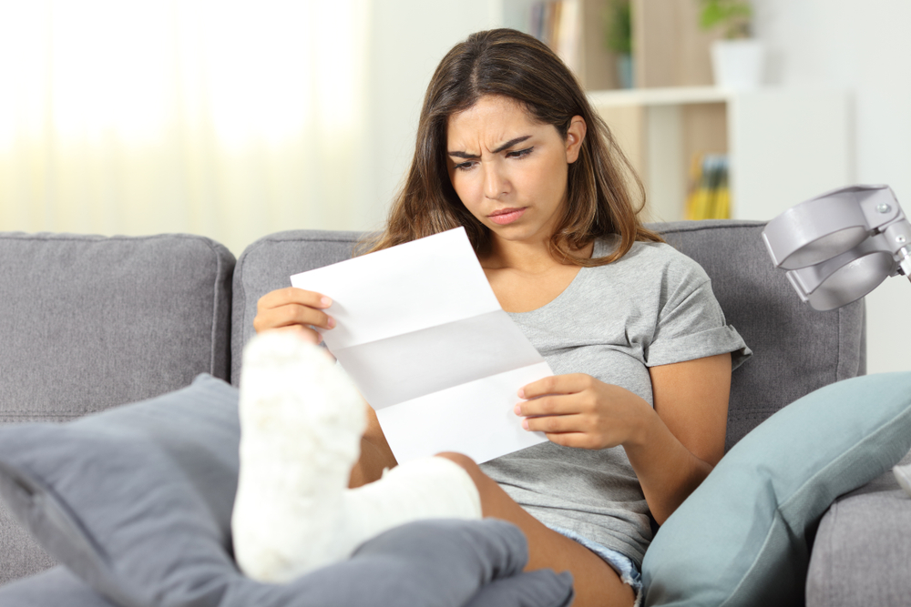 Woman looking at disability paperwork